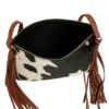 Rustic brown cowhide leather fringe clutch with decorative tassel details and adjustable strap for versatile styling options