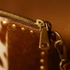 Vintage Lady Embellished Cowhide Clutch 3 Vintage lady embellished cowhide clutch detail showing embellishment pattern