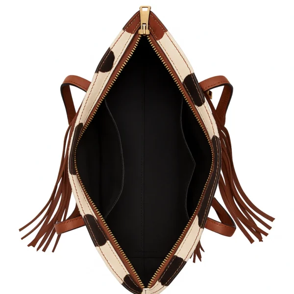 Luxurious brown calf hair tote bag featuring animal print texture, leather trim, sturdy handles, and spacious interior design