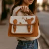 Gino Cute Cowhide Bag 6 Adorable pastel pink cowhide leather mini bag featuring playful panda face design with cute ears and secure snap closure