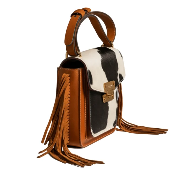 Zebra fringe cowhide belted bag detail close-up view