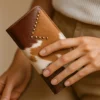 Mark Right Customized Mobile Phone Bifold Wallet 1 Luxurious brown leather bifold wallet with integrated phone holder displaying premium craftsmanship, multiple card slots, and elegant design
