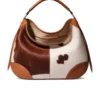 Crescent Moon Cowhide Hobo Bag 2 Brown cowhide leather crescent moon hobo bag showcasing curved silhouette with comfortable shoulder strap and spacious interior